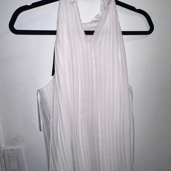 White top with black tie. - Picture 3 of 3